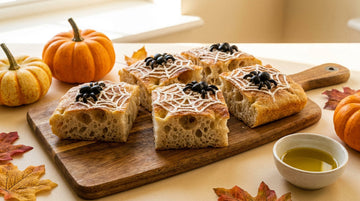 Spider-web sourdough focaccia squares with pumpkins